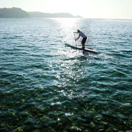 Hotel Slovenija - Terme & Wellness Lifeclass Portorož Eksteriør billede Stand-up paddle boarder on Lake Balaton